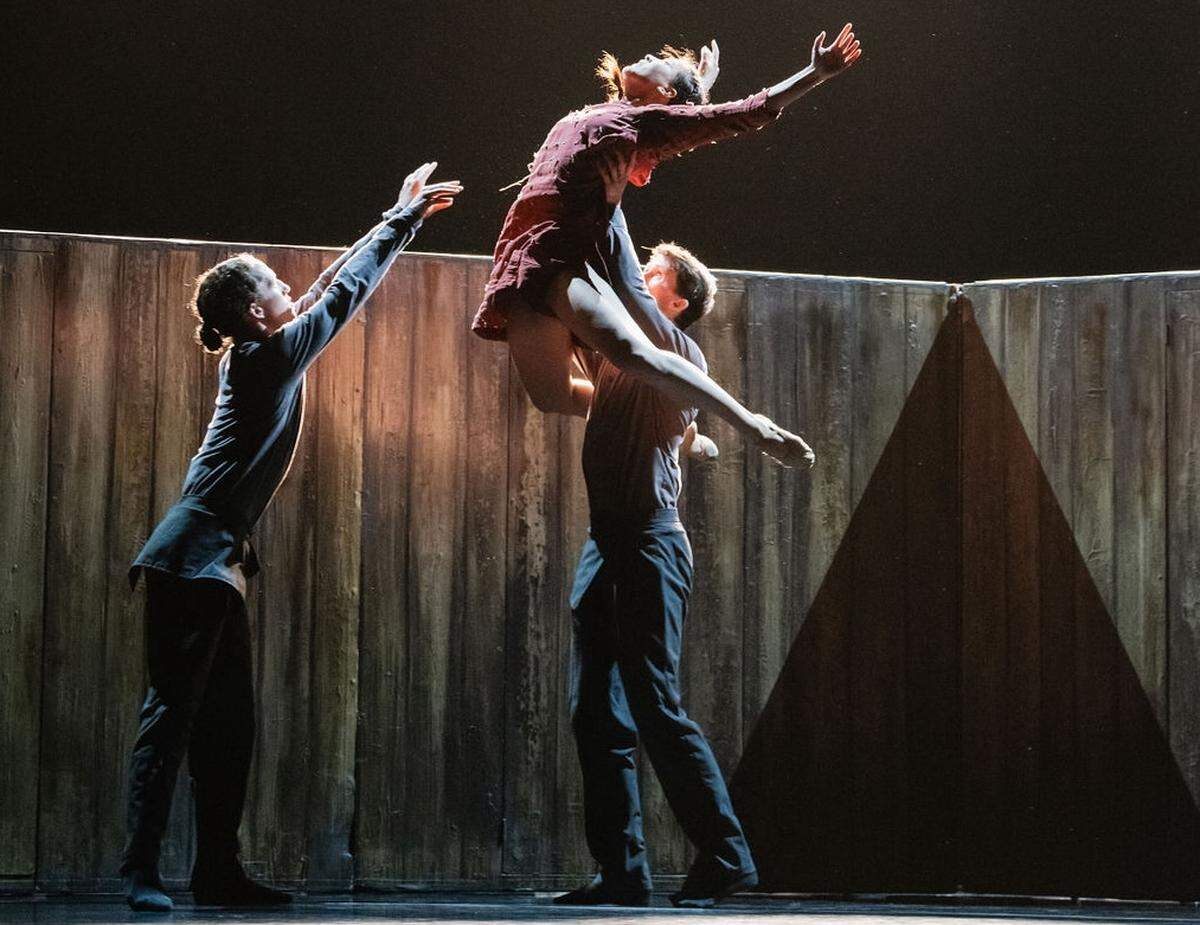 Dancer Remi Okamoto is held aloft during a Charlotte Ballet performance.