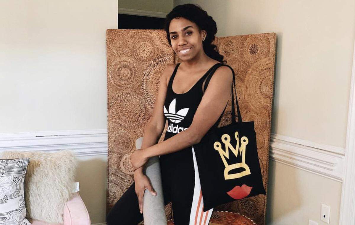Saloan Goodwin tunes in to beginners yoga via YouTube in the mornings before starting her 12- to 16-hour work days.