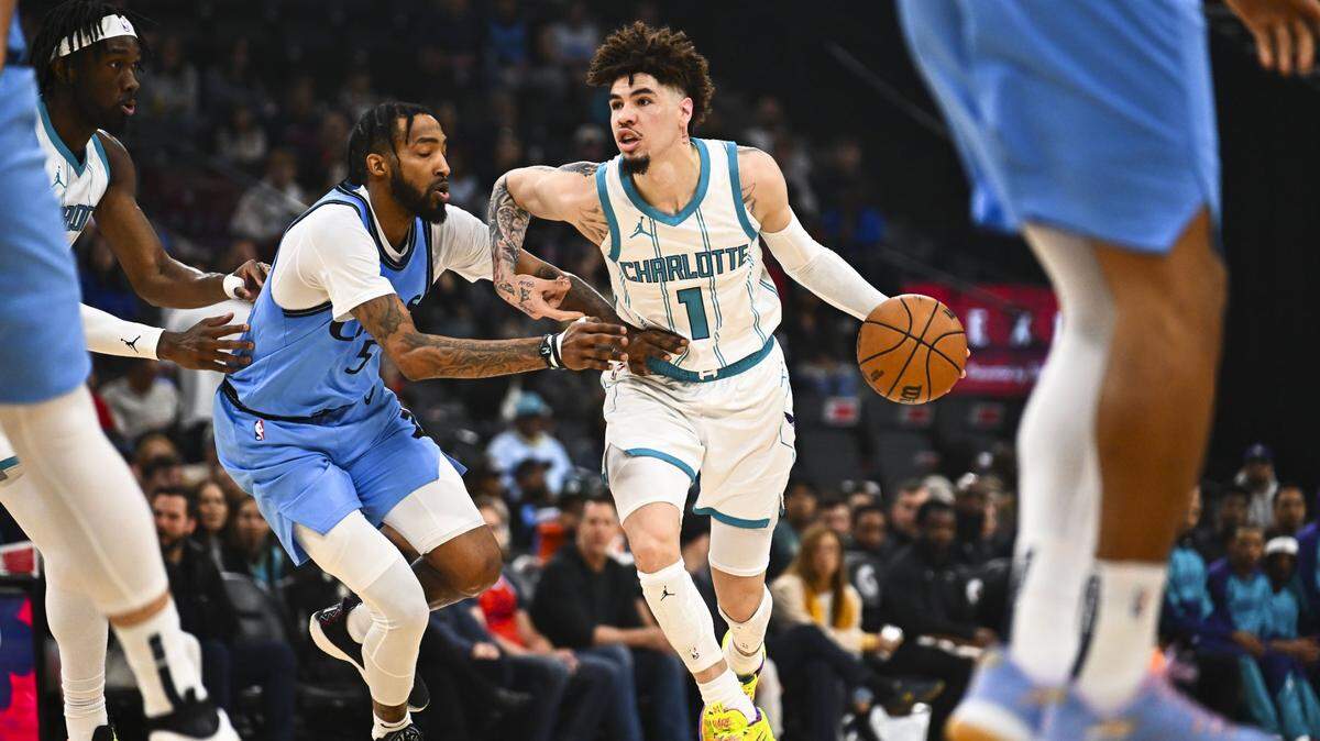 Charlotte Hornets guard LaMelo Ball (1) moves the ball against LA Clippers forward Derrick Jones Jr. (55) during the first half at Intuit Dome.