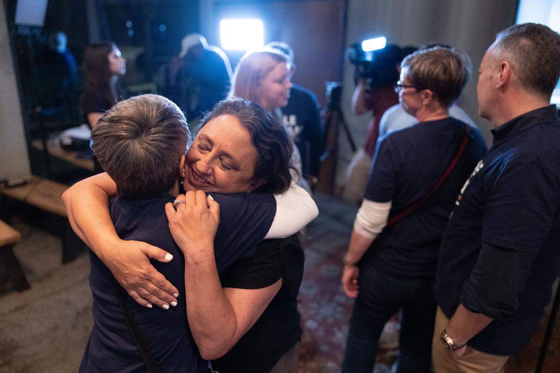 Nicole Sidman hugs her supporter during an election watch at Legion Brewing South Park in Charlotte Tuesday night, Nov. 5, 2024. GOP’s Tricia Cotham narrowly beats Sidman in NC House race
