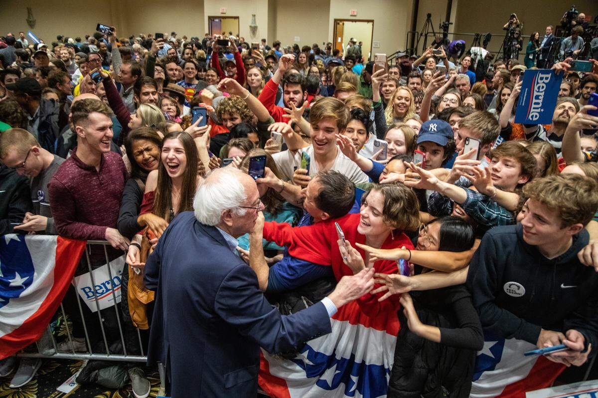 Sen. Bernie Sanders mingles with supporters during a campaign rally at the Durham Convention Center Friday, Feb. 14 2020. The campaign says about 3100 people attended the event.