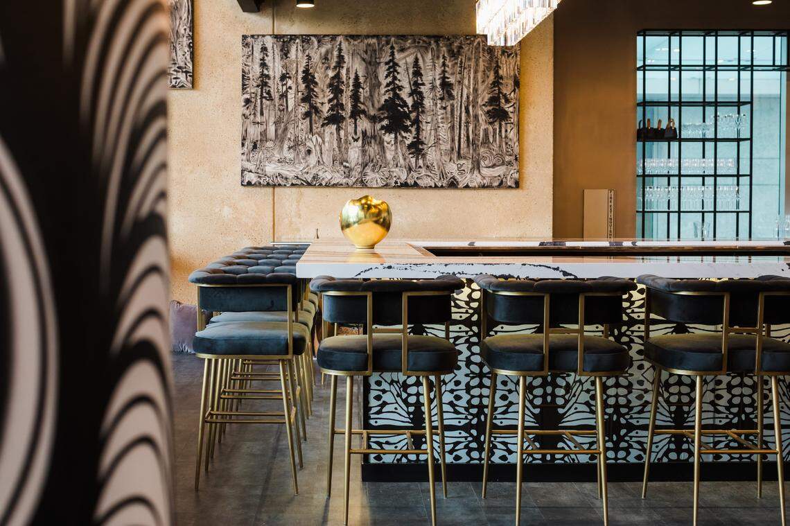 Check out Mariposa, the newest restaurant from Mother Earth Group. The space is modern and relaxing, with black and white decor and artwork by Charlotte muralist Owl.&nbsp;