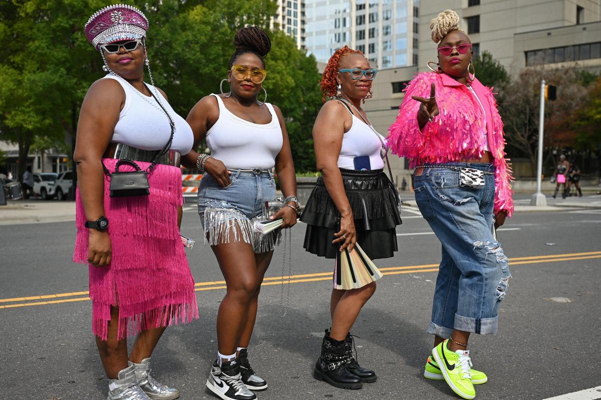 A friend group from D.C. strikes a pose before seeing Beyonce tonight at Bank of America Stadium on Wednesday, August 9, 2023 in Charlotte, NC.