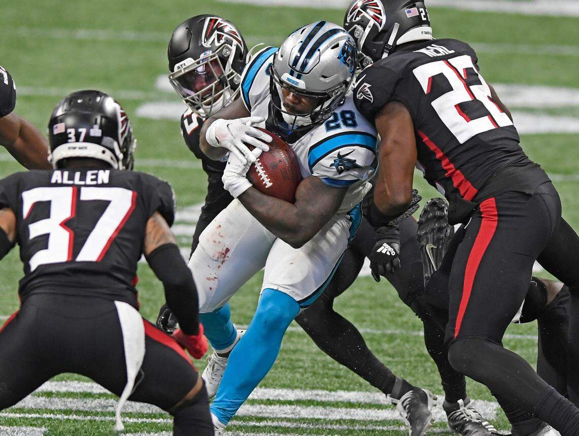 Carolina Panthers running back Mike Davis (28) powers through the Atlanta Falcons defense on Oct. 11th. Davis had 149 total yards from scrimmage and Carolina won 23-16.