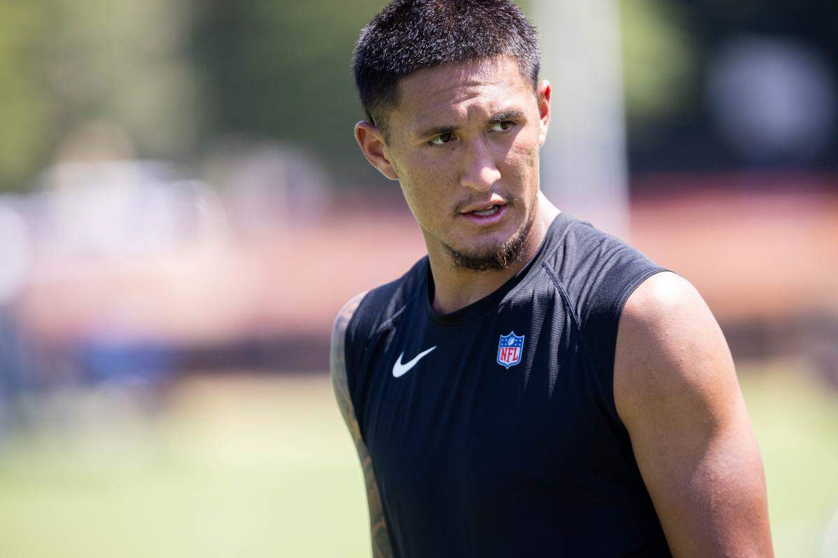 Jul 26, 2025; Charlotte, NC, USA; Carolina Panthers wide receiver Tetairoa McMillan (4) walks off after practice during training camp. 