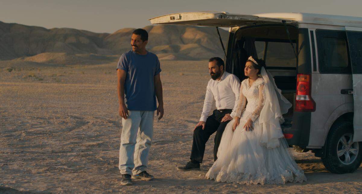 Mohamad Ali Elyasmehr, left, Majid Panahi, center, and Hadis Pakbaten in ‘It Was Just An Accident.’