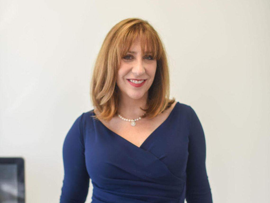 Matchmaker Laurie Berzack goes through dating prospects clients and help them with reaching out.