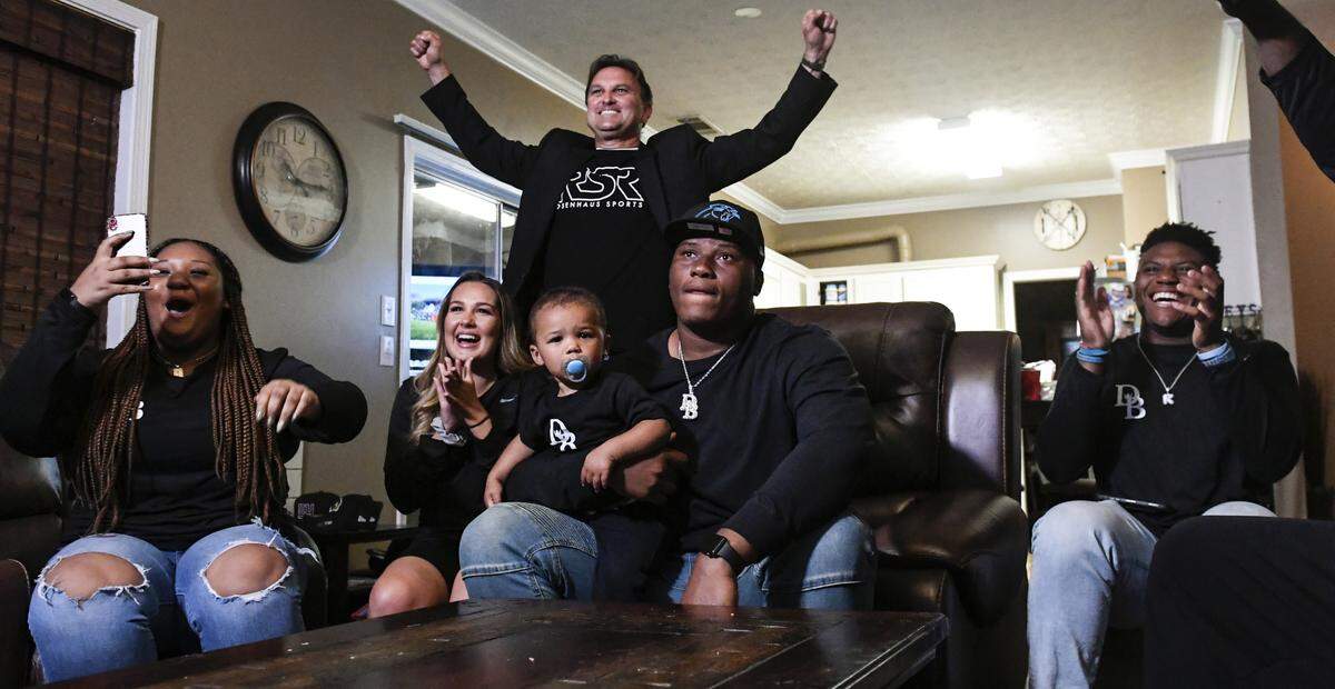 Former Auburn defensive tackle Derrick Brown was surrounded by his family and agent Drew Rosenhaus when he found out the Carolina Panthers were drafting him seventh overall.