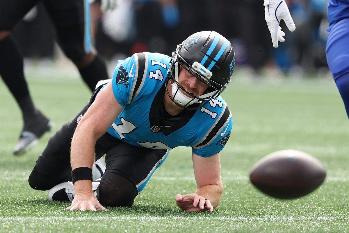 Carolina Panthers quarterback Andy Dalton fumbles the ball during the first quarter of Sunday’s game against the Buffalo Bills at Bank of America Stadium. It was one of Dalton’s three turnovers, as Carolina sustained a 40-9 loss.