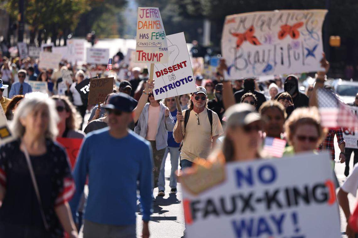 A crowd marches through uptown Charlotte on Saturday, Oct. 18, as part of the ‘No Kings’ rallies happening nationally to protest policies enacted by President Donald Trump.