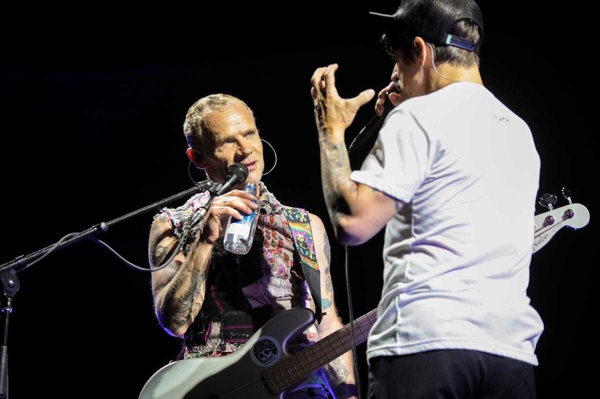 Bassist Flea and singer Anthony Kiedis perform during the Red Hot Chili Peppers’ show at Spectrum Center in 2017.