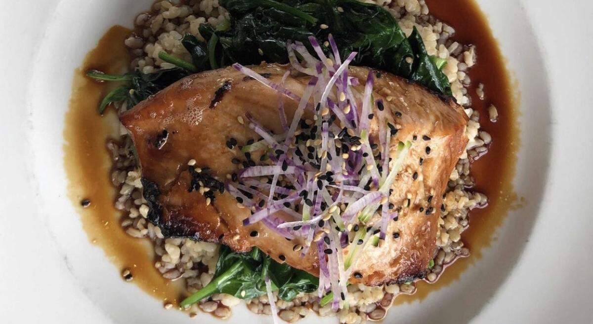 300 East’s Verlasso Sustainable Salmon with sesame shoyu glaze, short grain brown rice and sauteed kale.