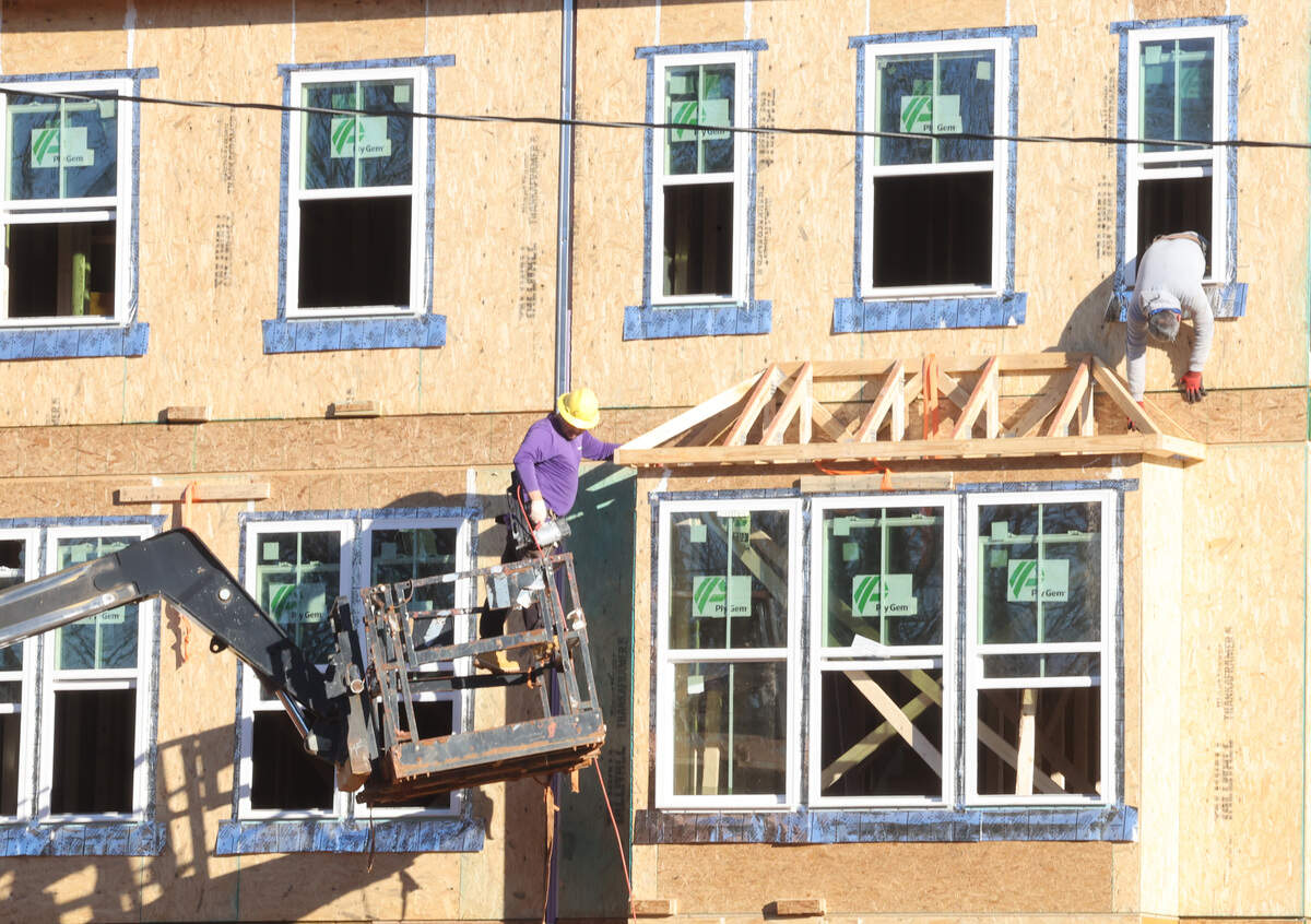A construction crew works on a plot of land on Mallard Creek Road. It’s one of two project being built in a one-mile radius. Another proposed development would have added 195 townhomes to the area but the developer has withdrawn its rezoning petition.