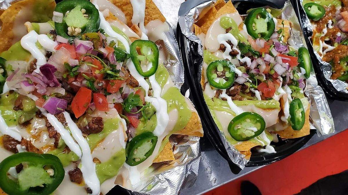 The Loaded Vaquero Nachos comes with fresh, made-to-order tortilla chips topped with your choice of protein and smothered in queso blanco, pico de gallo, fresh jalapeno, Mexican crema and guacamole salsa.