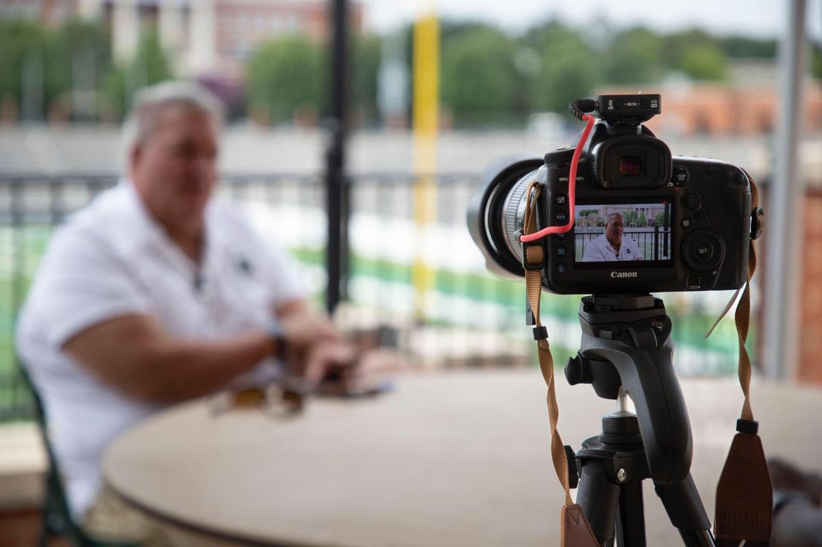 Charlotte 49ers coach Biff Poggi, answers questions from Cameron Williams and Langston Wertz Jr., at Jerry Richardson Stadium for the latest episode of Talking Preps.