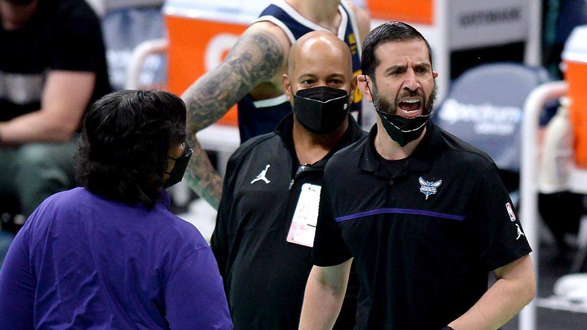 Charlotte Hornets head coach James Borrego, right, continues to argue a call against the team during third quarter action against the Denver Nuggets at Spectrum Center in Charlotte, NC on Tuesday, May 11, 2021. Borrego was ejected from the game.