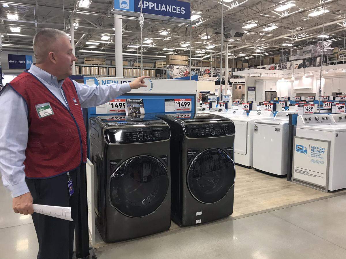 Bill Boltz, executive vice president of merchandising at Lowe’s, gives a tour of the company’s overhauled store on Ballantyne Commons Parkway on Wednesday.