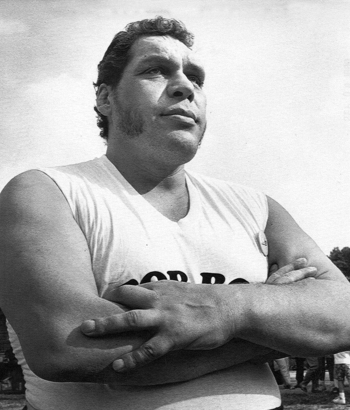 In an Observer file photo, pro wrestler Andre the Giant poses at his ranch in Ellerbe, N.C.
