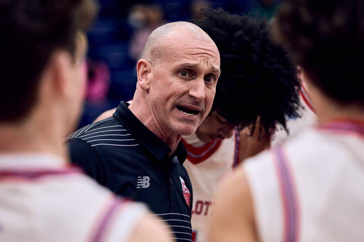 Charlotte Catholic Head Coach Mike King tries to get his players motivated following a timeout in the first half of the 2025 Charlotte Latin Invitational Finals against the SouthLake Christian Academy Eagles.