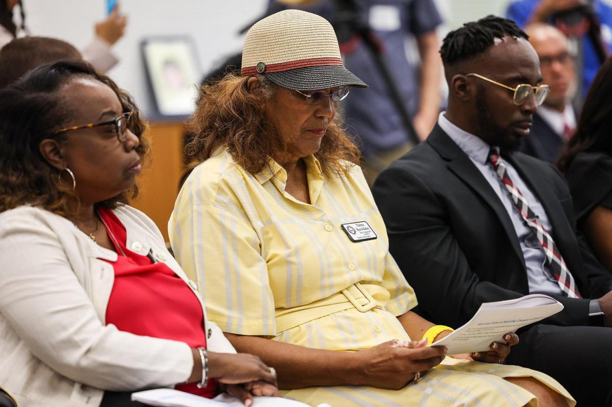 Thelma Byers-Bailey, Vice Chairperson, District 2, of the Board of Education, reads over a copy of the results of the North Carolina Department of Public Instruction 2021-2022 student academic performance data report for CMS during a press conference at Allenbrook Elementary School on Thursday, August 1,20022. The annual school accountability report helps promote the academic achievement of all public-school students and assists in understanding and gauging student and school performance against state and national standards. Key indicators include student performance on required end of grade and end of course tests, school performance grades for schools and academic growth outcomes for schools.
