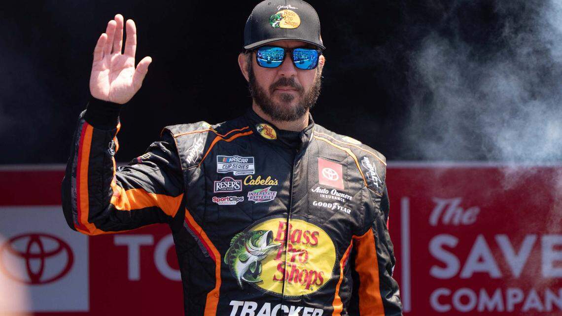 Jun 9, 2024; Sonoma, California, USA; NASCAR Cup Series driver Martin Truex Jr. (19) waves as he gets introduced to fans before the start of the Toyota / Save Mart 350 at Sonoma Raceway.