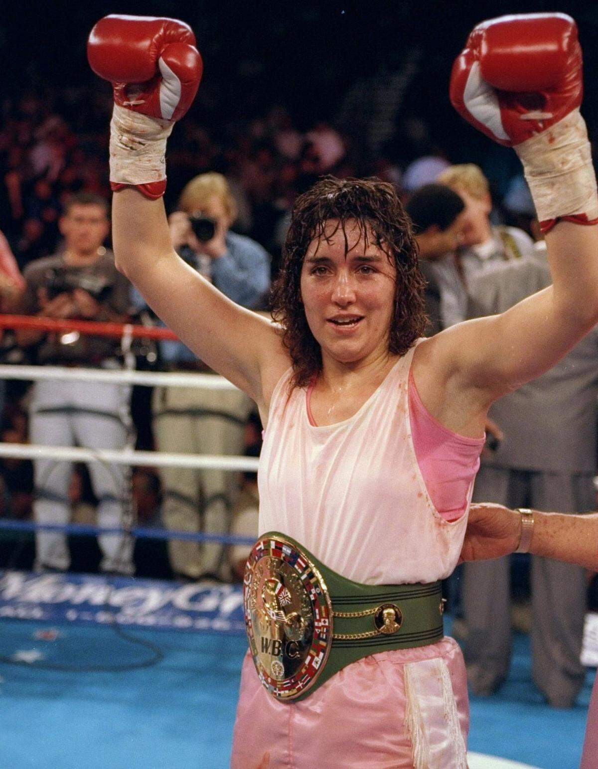 Christy “The Coal Miner’s Daughter” Martin is a pioneering Hall of Fame boxer with a professional record of 49 wins, 7 losses, and 3 draws.
