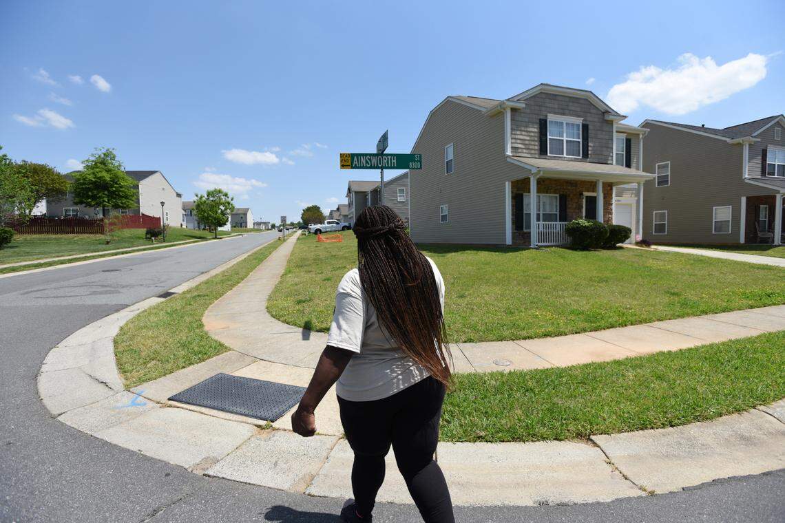 Volenteer Pattache Roper makes her way to renters who live in a neighborhood during the canvassing in Charlotte on Saturday, April 23, 2022. Action NC is working to add tenants of corporate landlords to a national tenants union.