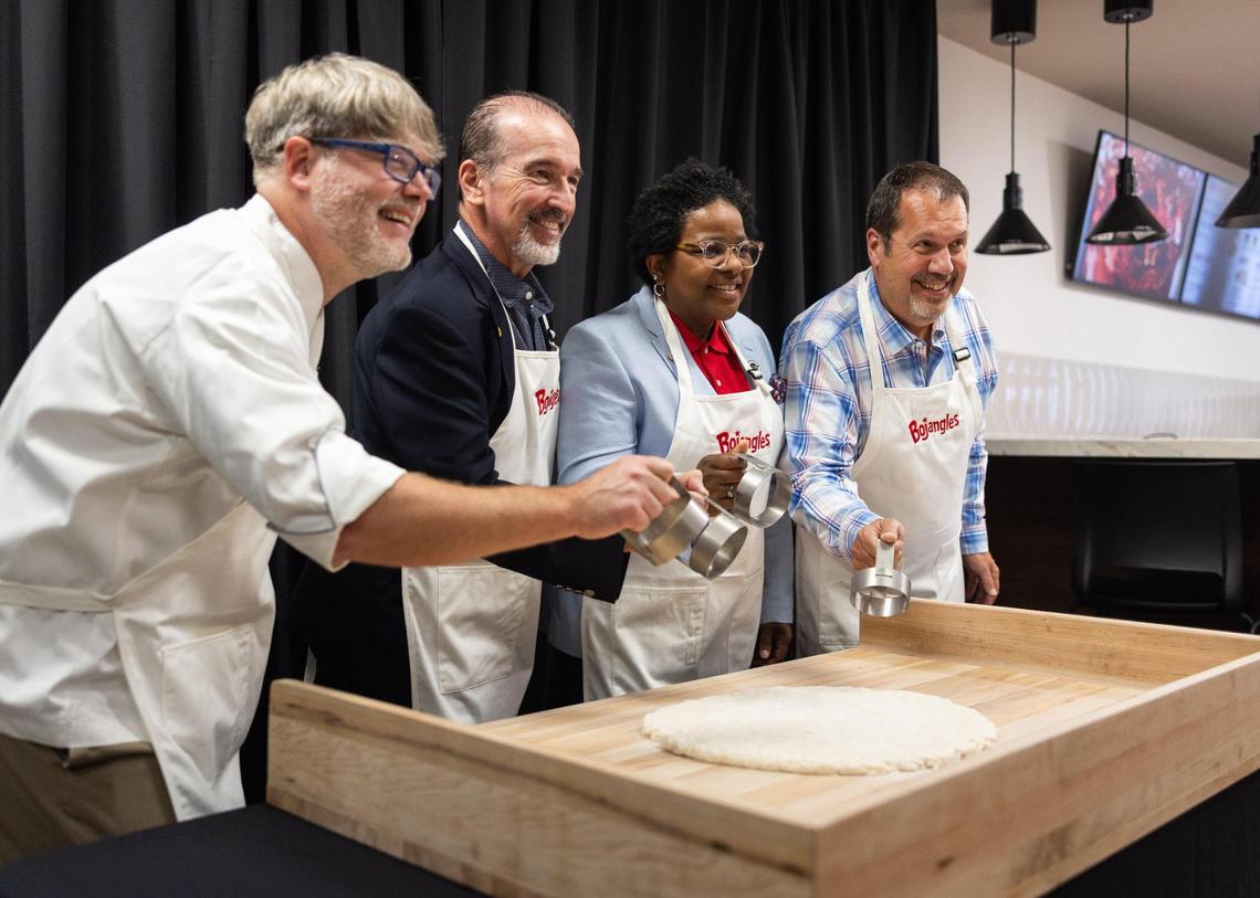 Bojangles held a biscuit-cutting ceremony Tuesday, June 24, 2025, during the grand opening of the Bojangles Support Center in south Charlotte, N.C. From left, Jim Cannon, Bojangles chief development officer, Bojangles CEO Jose Armario, Charlotte Mayor Pro Tem Danté Anderson and Bojangles Chief Development Officer Jim Cannon.
