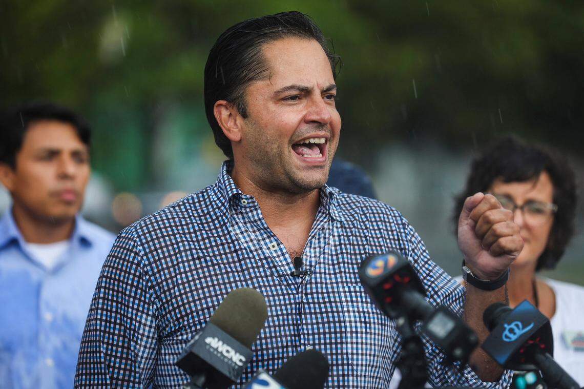 Republican City Councilman Tariq Bokhari speaks to media about re-opening the open air flea market off CentraL Avenue on Wednesday, July 13, 2022 in Charlotte, NC.