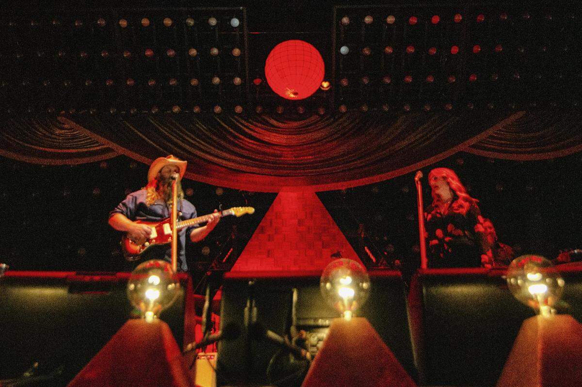 Chris Stapleton and his wife Morgane Stapleton during his concert Thursday night at PNC Music Pavilion in Charlotte.