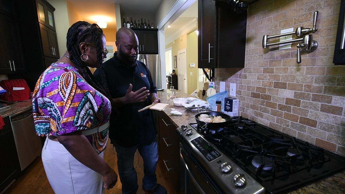 Chef Michael Bowling of Hot Box in Charlotte makes fried chicken.