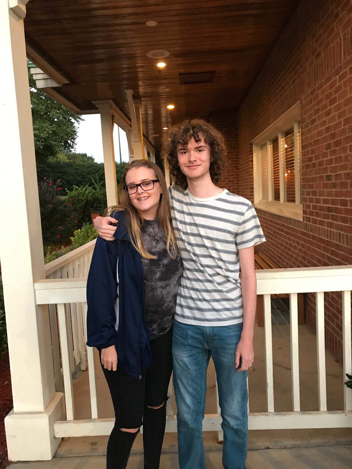 Reed Parlier poses in a recent family photo with his younger sister Mallory. Says their mother, Julie Parlier: “Whereas his sister was the outgoing, loud presence in the room, Reed kind of sat in the background. But he took everything in. Even as a baby, he was the one that was just kind of quiet and observant to what was going on.”