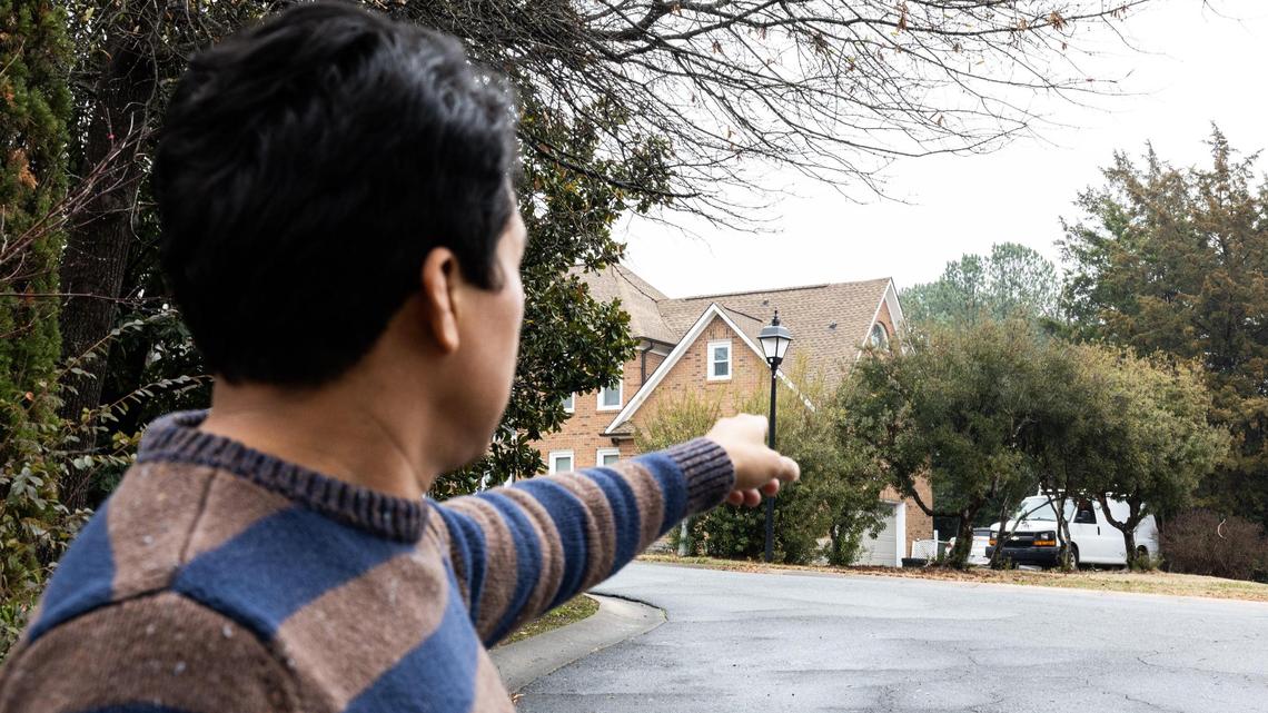 In this 2025 file photo, Jeffrey Baldwin points out there are other commercial vehicles in his neighborhood that his neighbors have not been fined for.