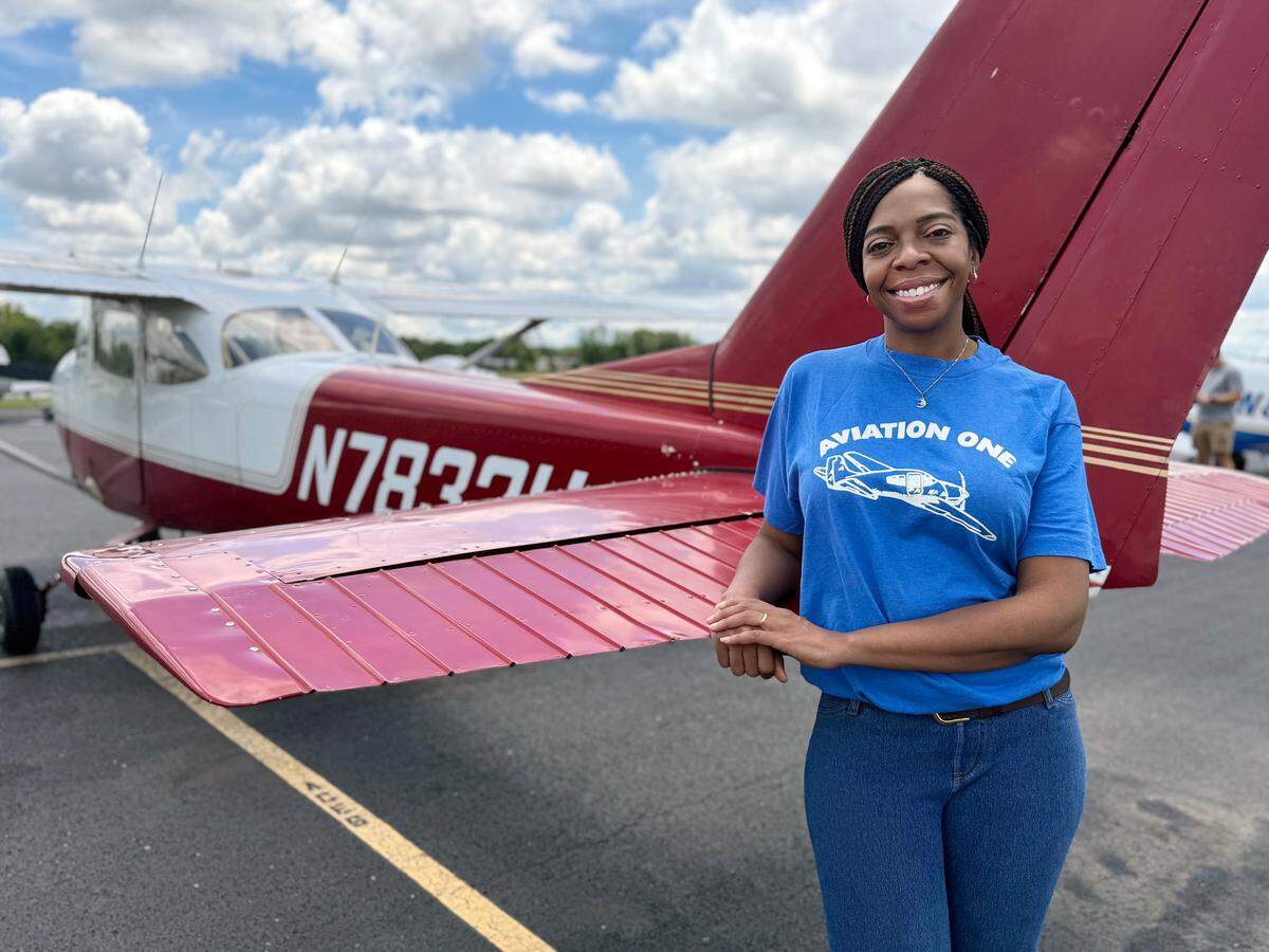 Adrienne Heath, 44, stands next to a plane at the Rock Hill-York County Airport similar to one she flew as a youth. That opportunity came in the summer of 1994 for her and several dozens Rock Hill teens aged 14 to 17. The teens, most from lower economic backgrounds, participated in HiTek Aviation One, a summer youth employment program, which operated through the then-Catawba Regional Planning Council.