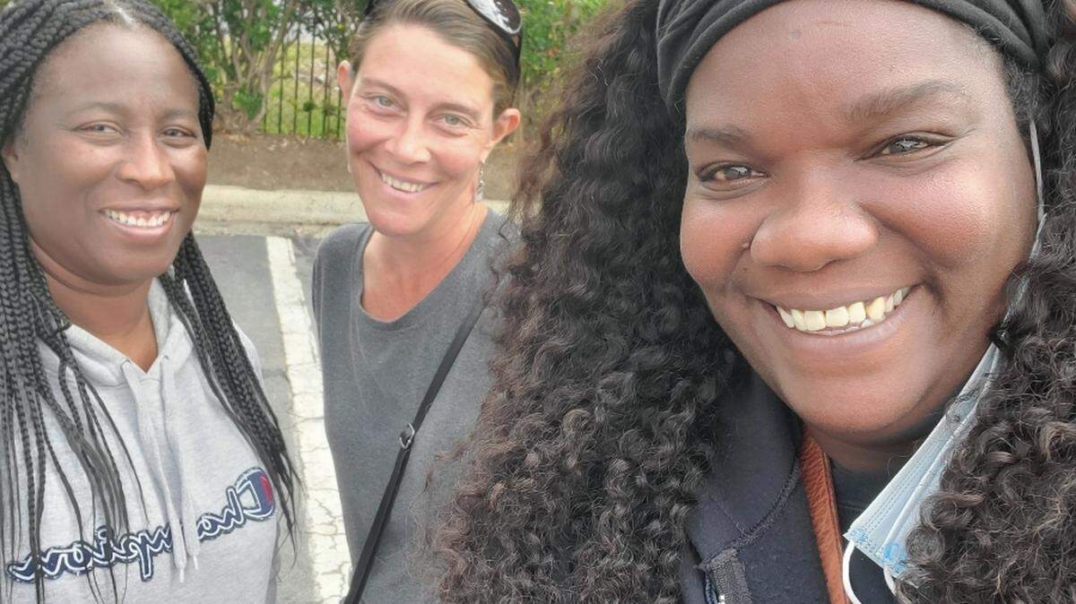 From left: Janette Kinard, executive director of Champion House of Care, Laura Gorecki, chief dignity officer at Project Outpour, and Jessica Lefkowitz, executive director at Hearts For the Invisible Charlotte Coalition. The nonprofits teamed up to organize a health and wellness fair in Charlotte’s Sugar Creek corridor.