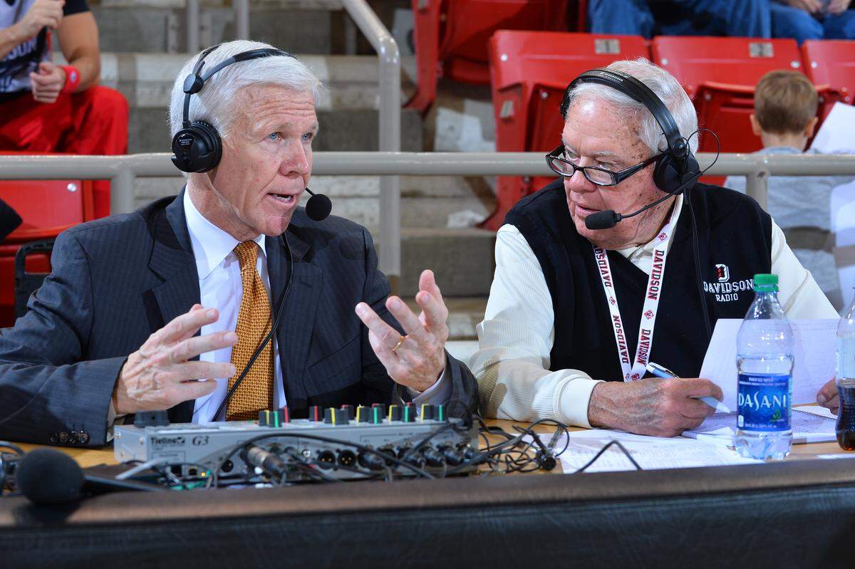 John Kilgo (right) interviews Davidson head coach Bob McKillop on the radio in 2015. Kilgo was the voice of the Davidson basketball team from 2000-18.