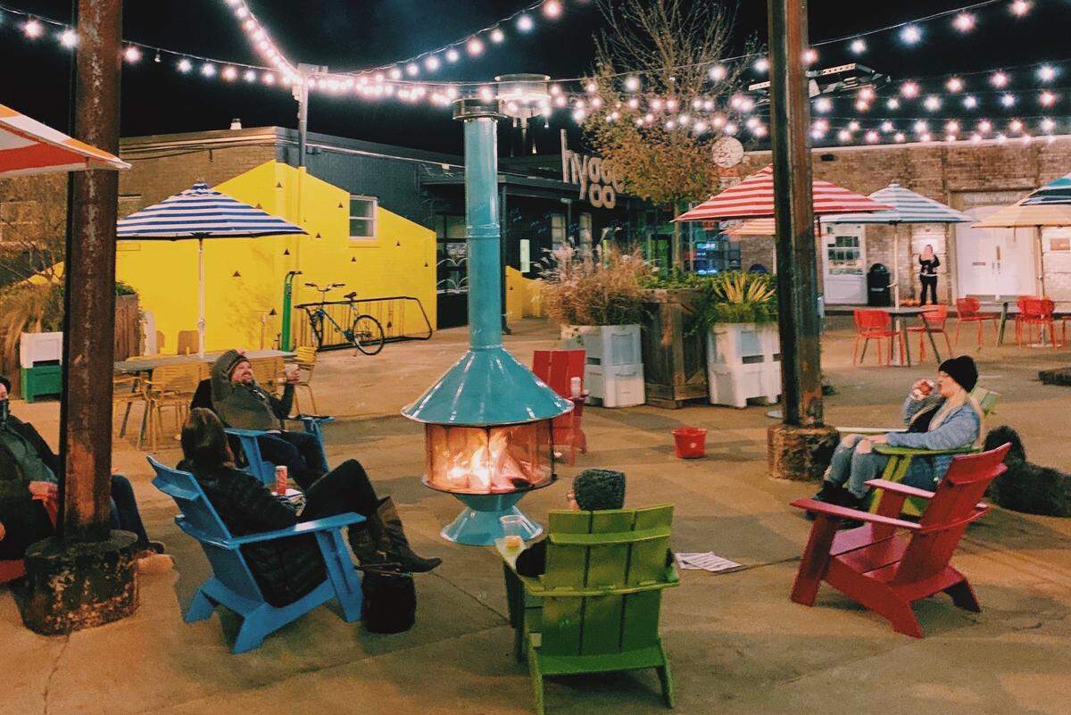 Infrared heaters and fire pits are found throughout Camp North End, offering guests a place to warm up.