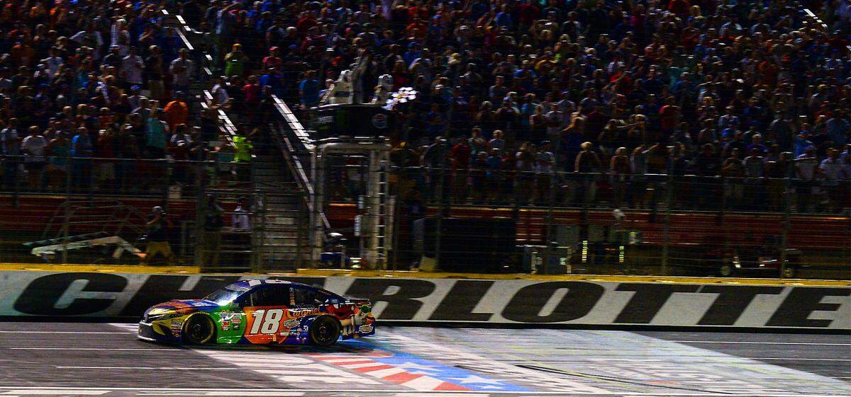 NASCAR driver Kyle Busch crosses the finish line to win the NASCAR Monster Energy All-Star Race on Saturday, May 20, 2017 at Charlotte Motor Speedway in Concord, NC. 