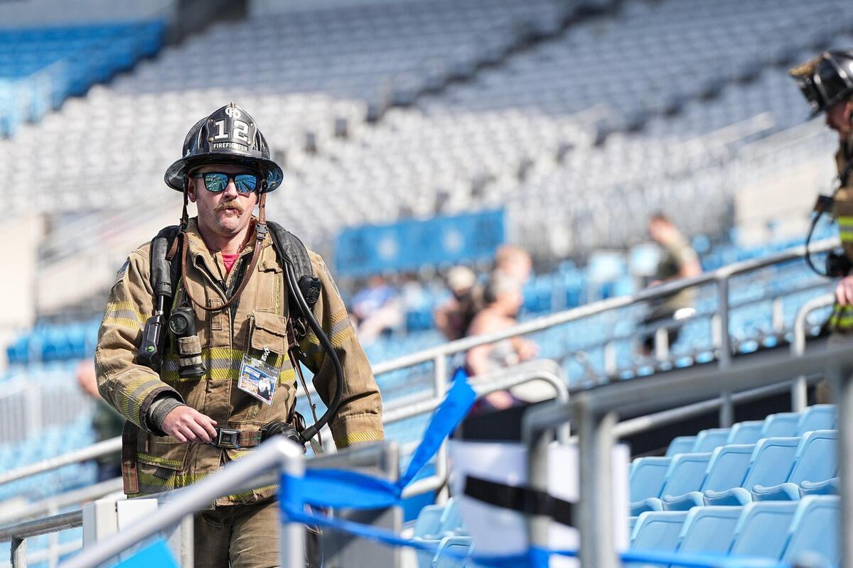 A firefighter participates in the Tunnel to Towers Tower Climb at Bank of America Stadium, Sunday, April 27, 2025, in Charlotte