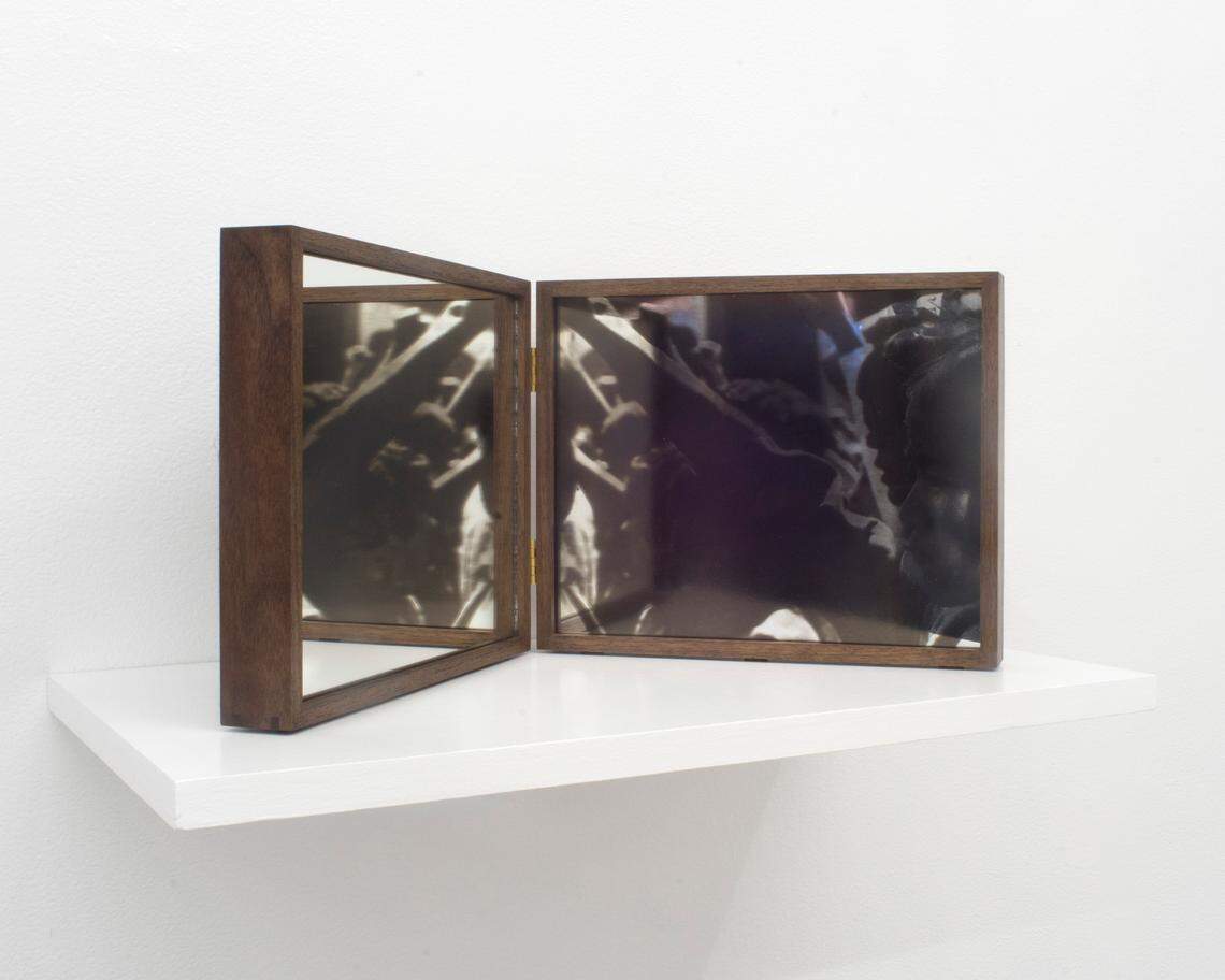 “We Are Beside Ourselves_ Reflection: Bobby Huttons funeral in Oakland, 1968”, Hồng-An Trương, carbon single transfer print on mirror, 2018