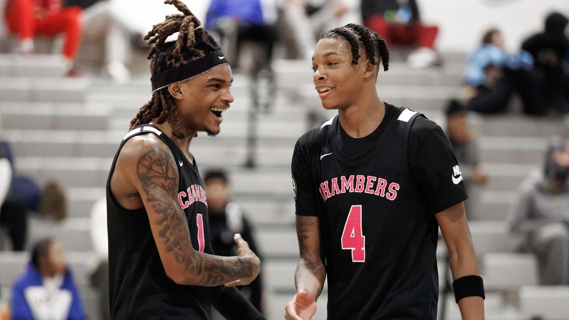 Chamber’s Markus Kerr (1) celebrates Tarris Bouie III (4) dunk during late 2nd quarter action. Cox Mill high school would host the Mike Gminski Classic Monday December 23, 2024.