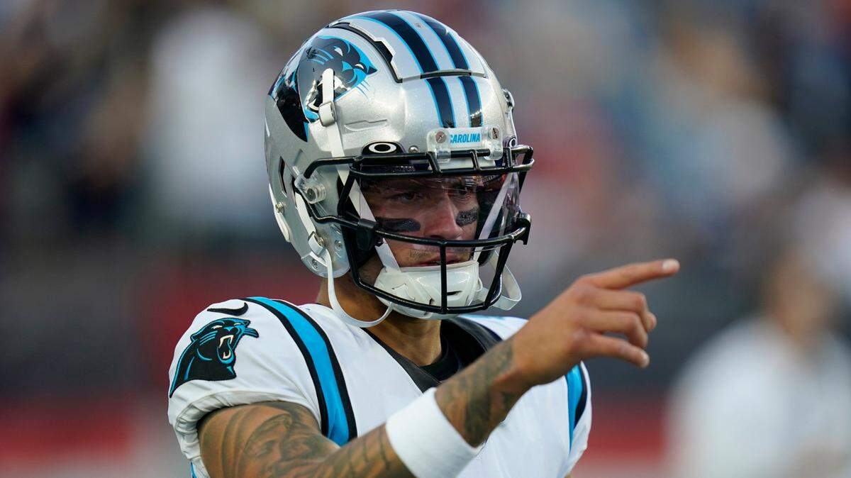 Carolina Panthers rookie quarterback Matt Corral (9) warms up prior to a preseason NFL football game against the New England Patriots on Aug. 19, 2022. Corral left the game in the fourth quarter with a foot injury that would cause him to miss the entire 2022 regular season.