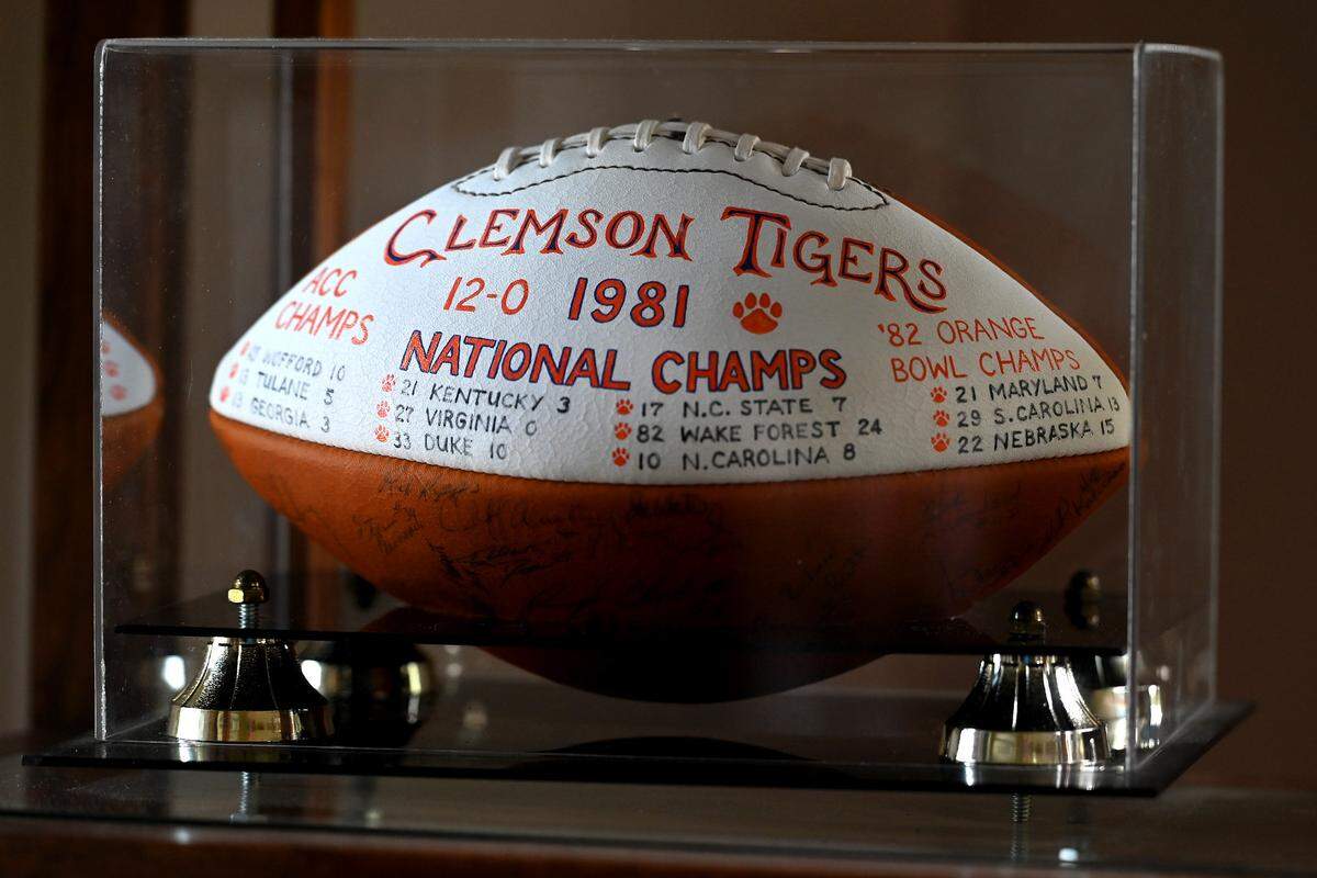 A football is among the mementos that are displayed in former Clemson Tigers head football coach Danny Ford’s home office on Friday, July 22, 2022. Ford led the Tigers to a 12-0 season in 1981. Ford won ACC Coach of the Year in 1981 and was inducted into the College Football Hall of Fame in 2017.