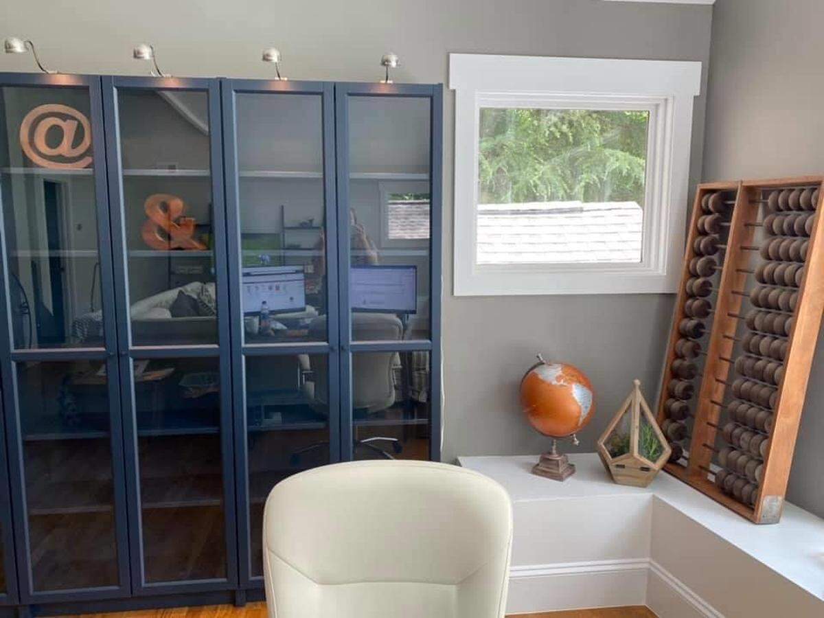 Heather Harjes was sitting in front of an empty bookcase in her newly remodeled home for video meetings until her coworkers teased her, so she added a few decorations.