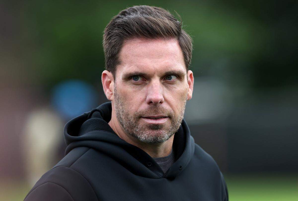 Carolina Panthers general manager Dan Morgan watches the team run through drills during an OTA practice on May 27, 2025 in Charlotte. 