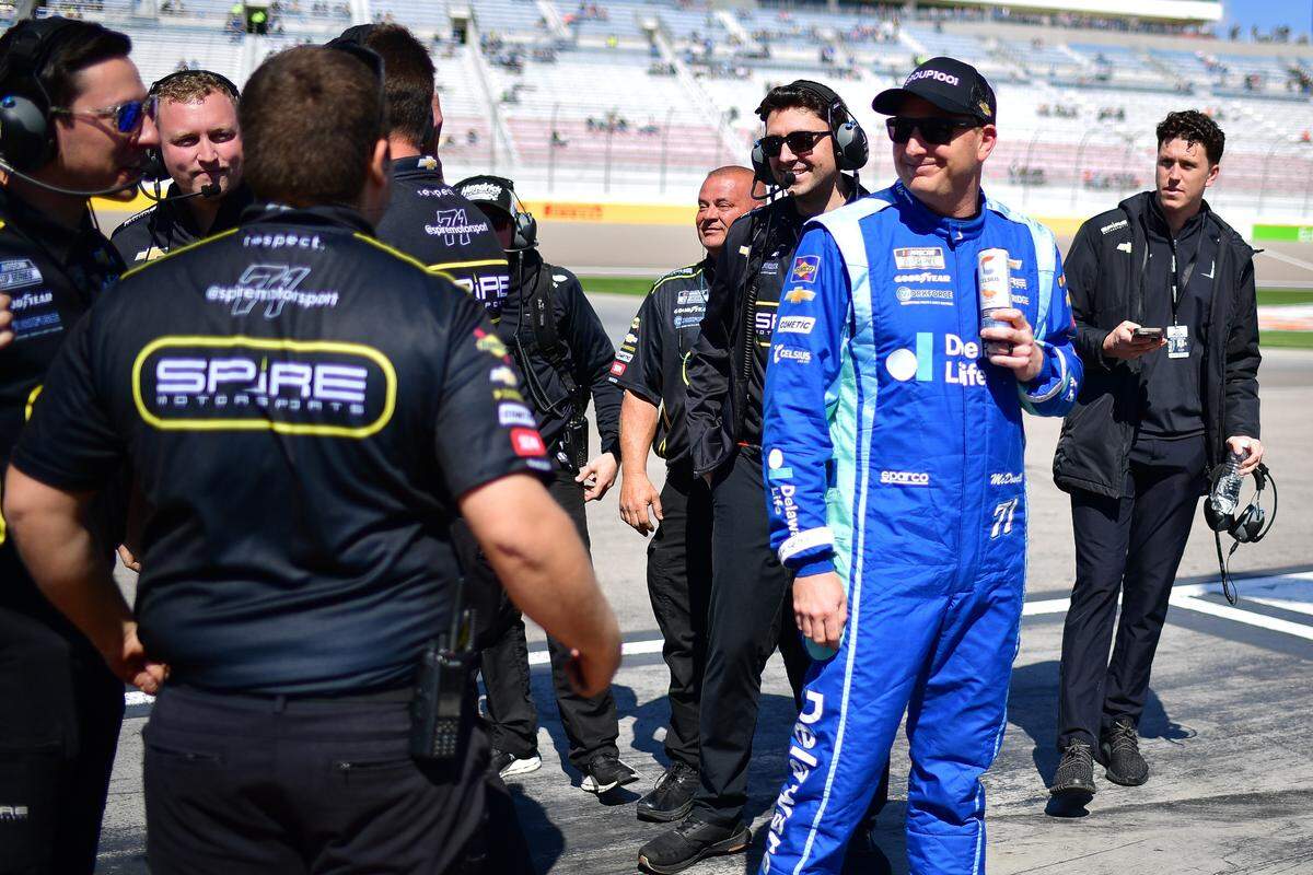 Mar 15, 2025; Las Vegas, Nevada, USA; NASCAR Cup Series driver Michael McDowell (71) reacts after qualifying for pole position for the Pennzoil 400 at Las Vegas Motor Speedway.