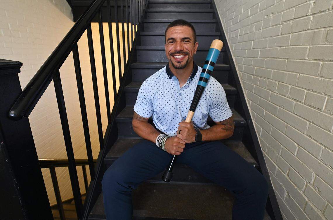 Former Carolina Panthers safety Kurt Coleman on Thursday, April 3, 2025. Coleman is holding a baseball bat - not the original bat from Steve Wilks’ story the night before the New York Giants game in 2015, but a commemorative bat that Panthers center Ryan Kalil had made and presented to all the defensive backs later that season.