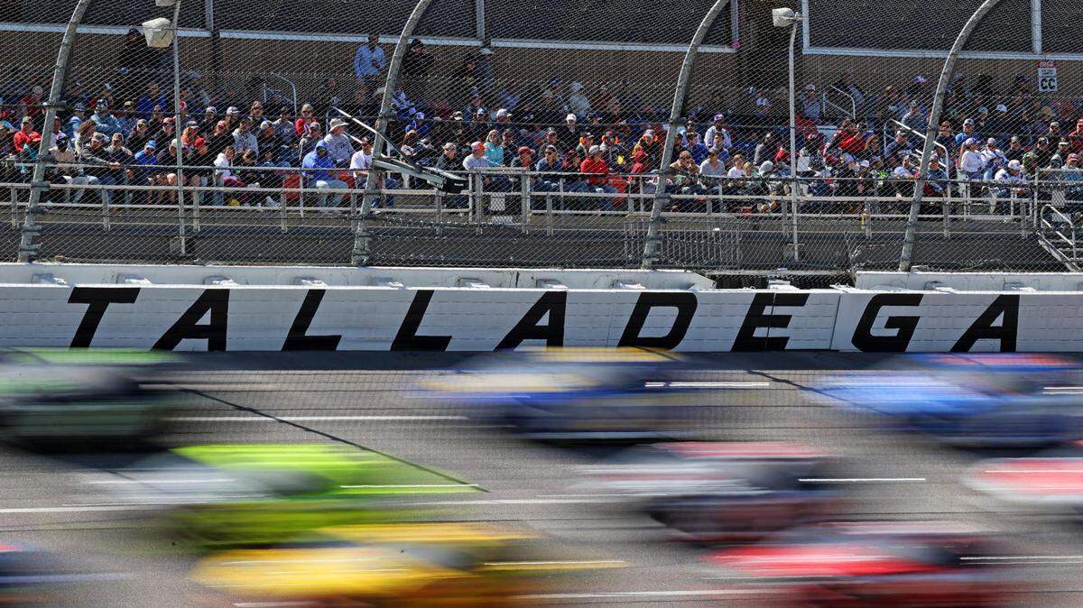 Apr 21, 2024; Talladega, Alabama, USA; The field races through the trioval during the GEICO 500 at Talladega Superspeedway.