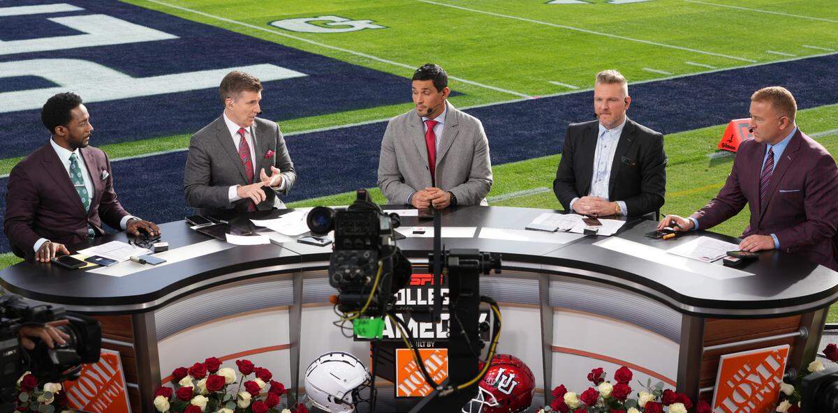 ESPN broadcasters Desmond Howard, Chris Fowler, Mark Sanchez, Pat McAfee and Kirk Herbstreit on the College Gameday set at the 109th Rose Bowl in Pasadena, Calif. in Jan. 2023.