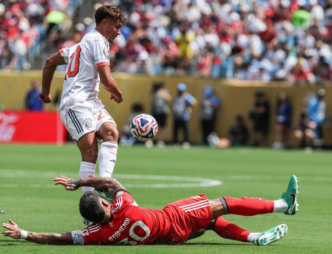 Bayern München’s midfielder Tom Bischof, kicks the ball away from S.L. Benfica’s defender Nicolas Otamendi during the FIFA Club World Cup at Bank of America Stadium in Charlotte, NC on Tuesday, June 24, 2025.